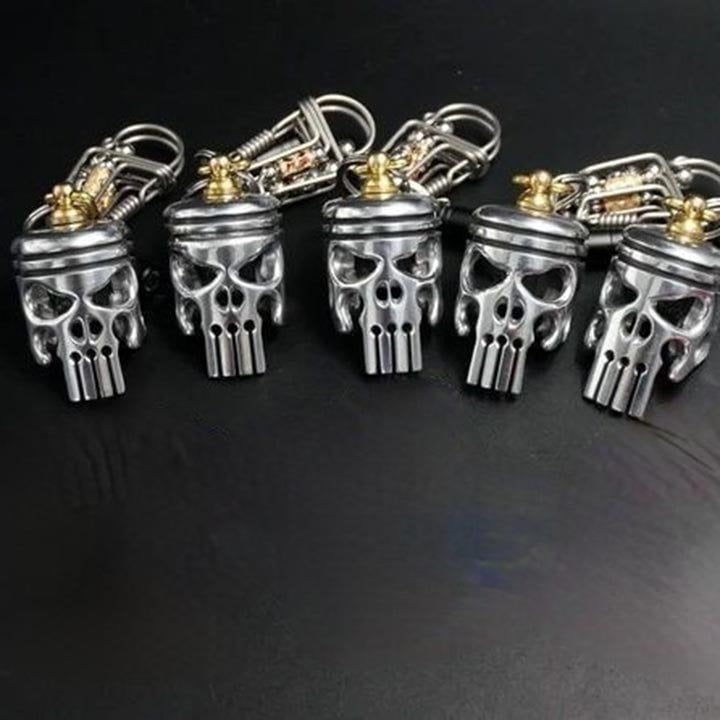 Piston art skull keychain (pendant\/flashlight\/bottle opener)